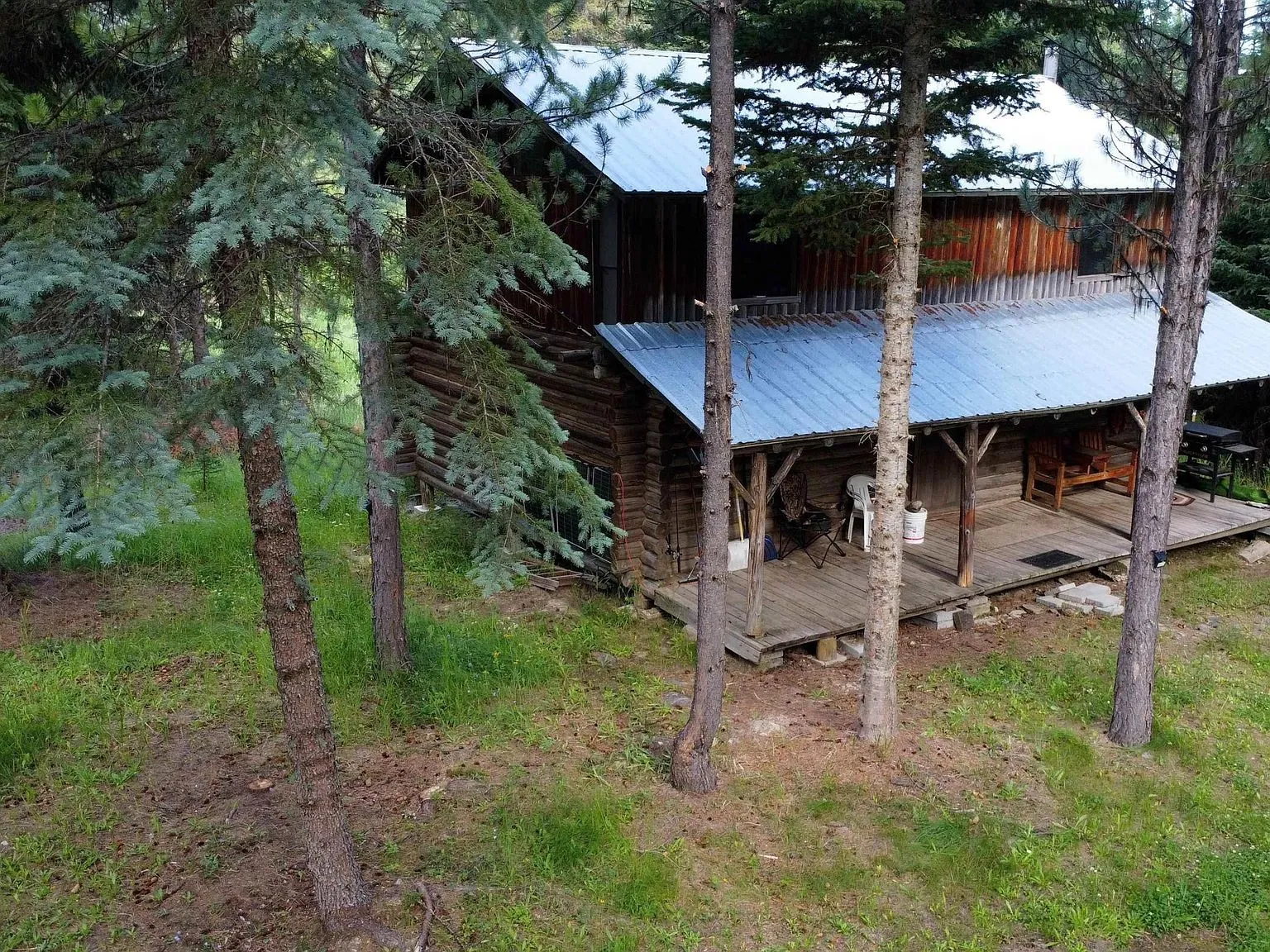 An aerial view of the South Fork Yaak River winding past the wooded property