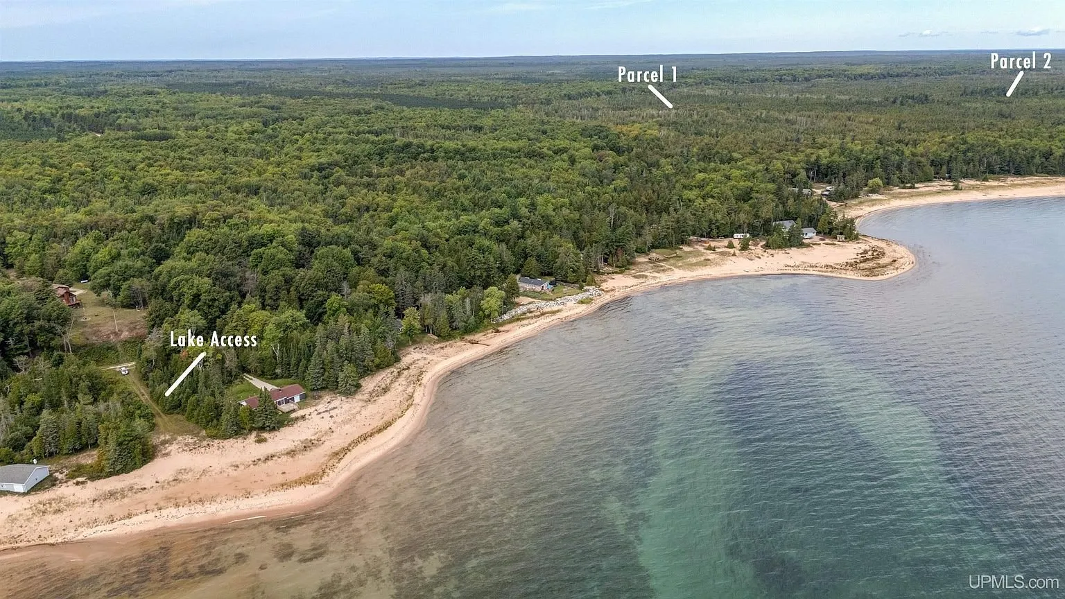 The shore from the air with the lake access marked among the cottages and the two parcels marked far inland