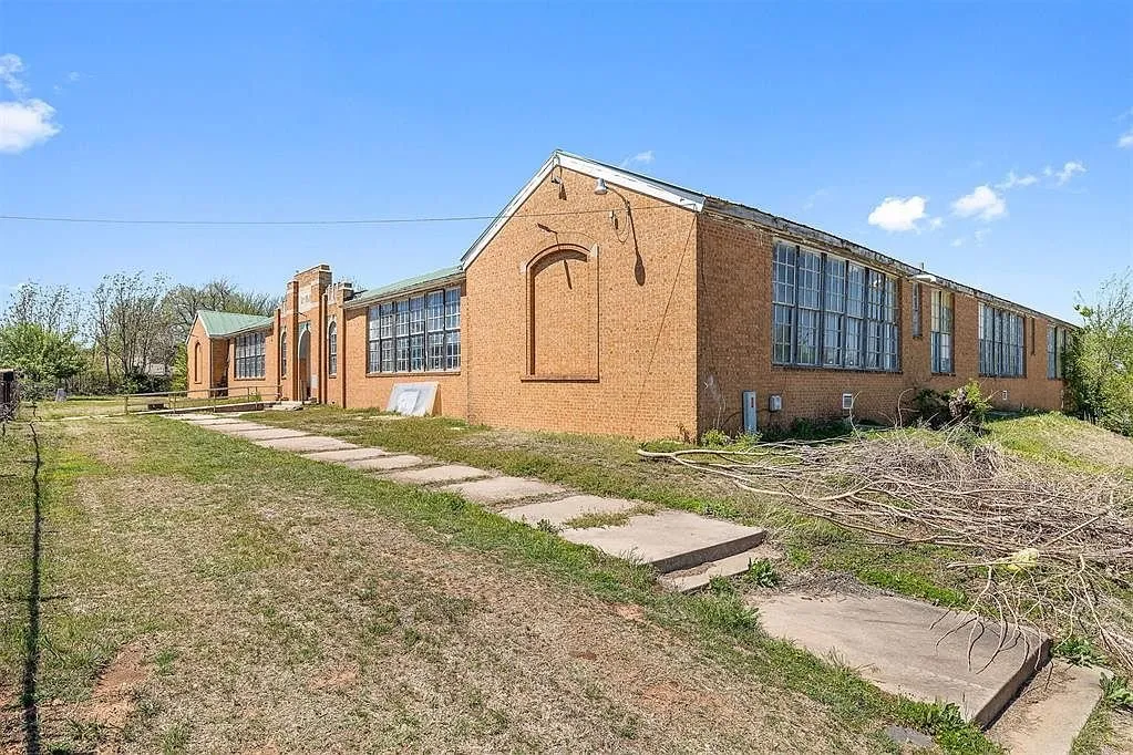 The side wing from the lawn with the walk and the gabled end