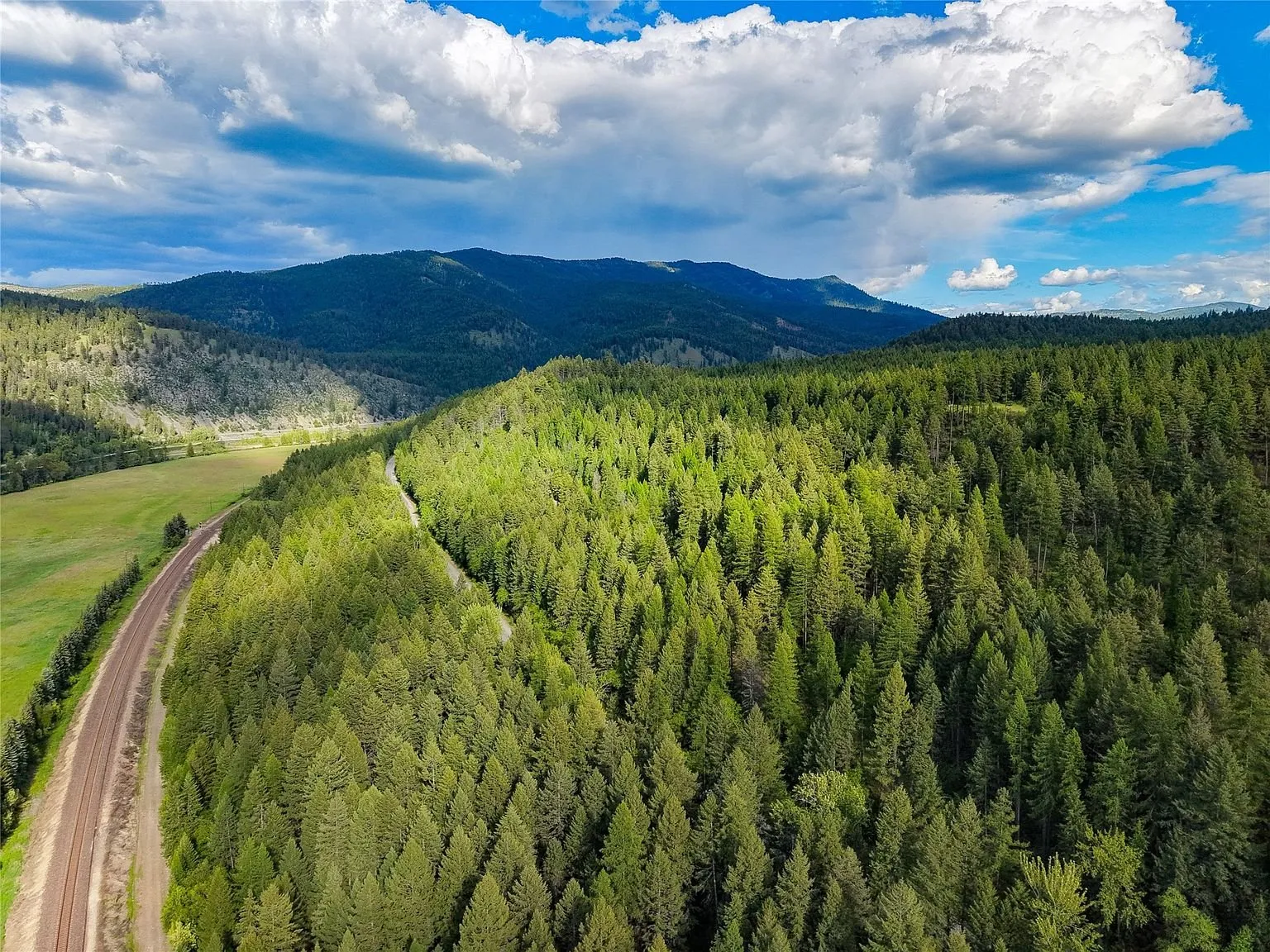 An aerial view of forested ridgeline along Jennings Haul Rd