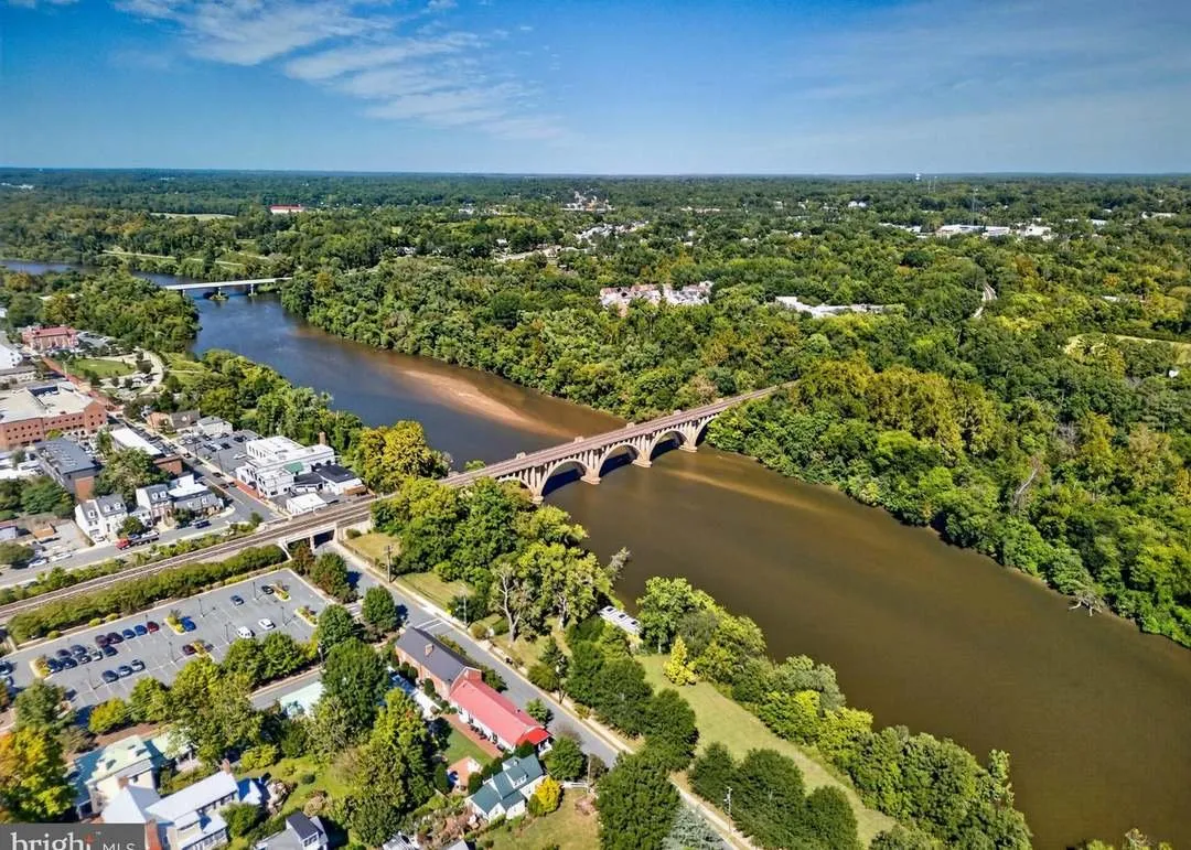 An aerial view of the Rappahannock River and the Chatham Bridge toward downtown Fredericksburg