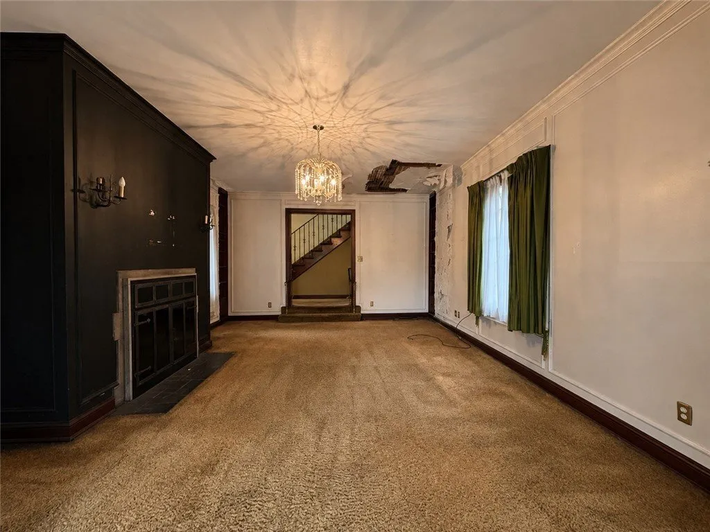 The dining room from the fireplace end looking toward the stair