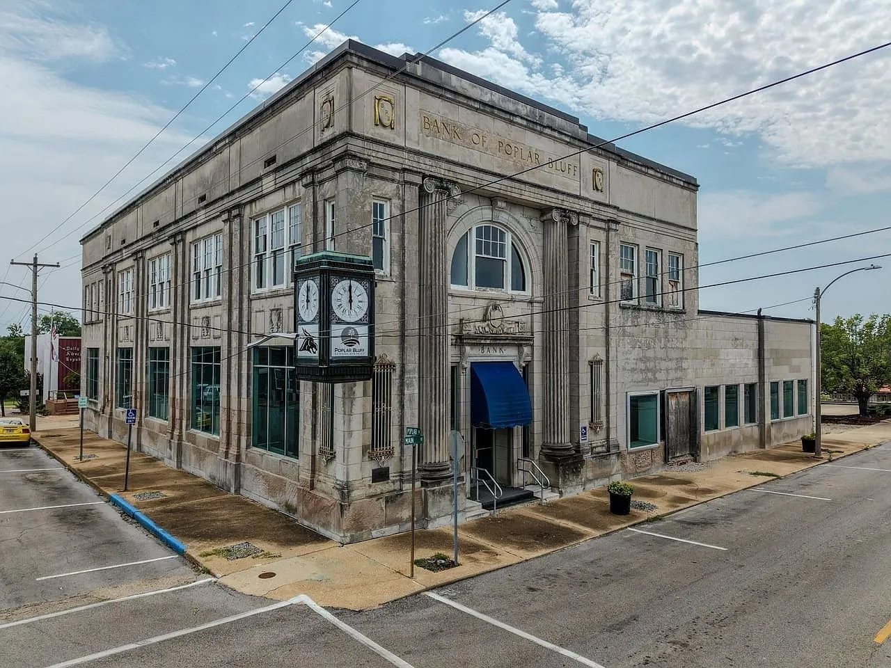 Aerial of the building from the corner with the parking lanes on Main Street