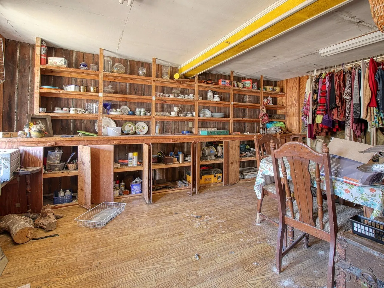 The store's shelving still lined with dishes and glassware