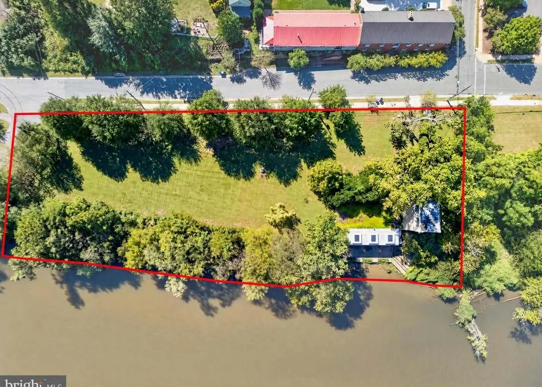 An aerial map marking the approximate 1.45-acre property boundary