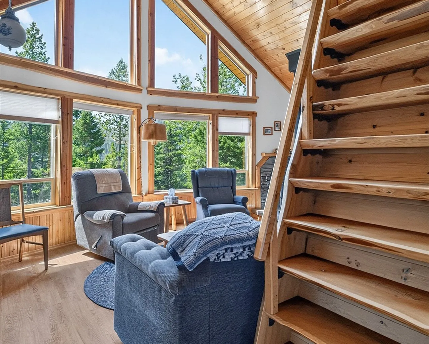 A second deck view looking out toward the surrounding forest