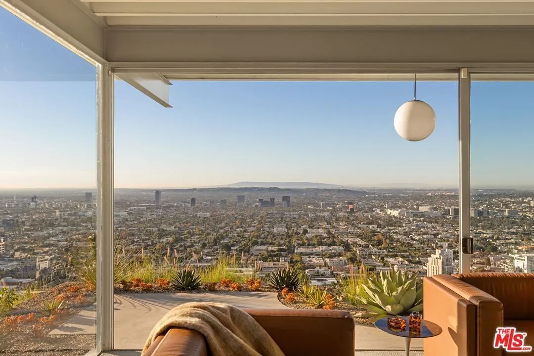 The panorama from inside the living room, the city stretching to the horizon