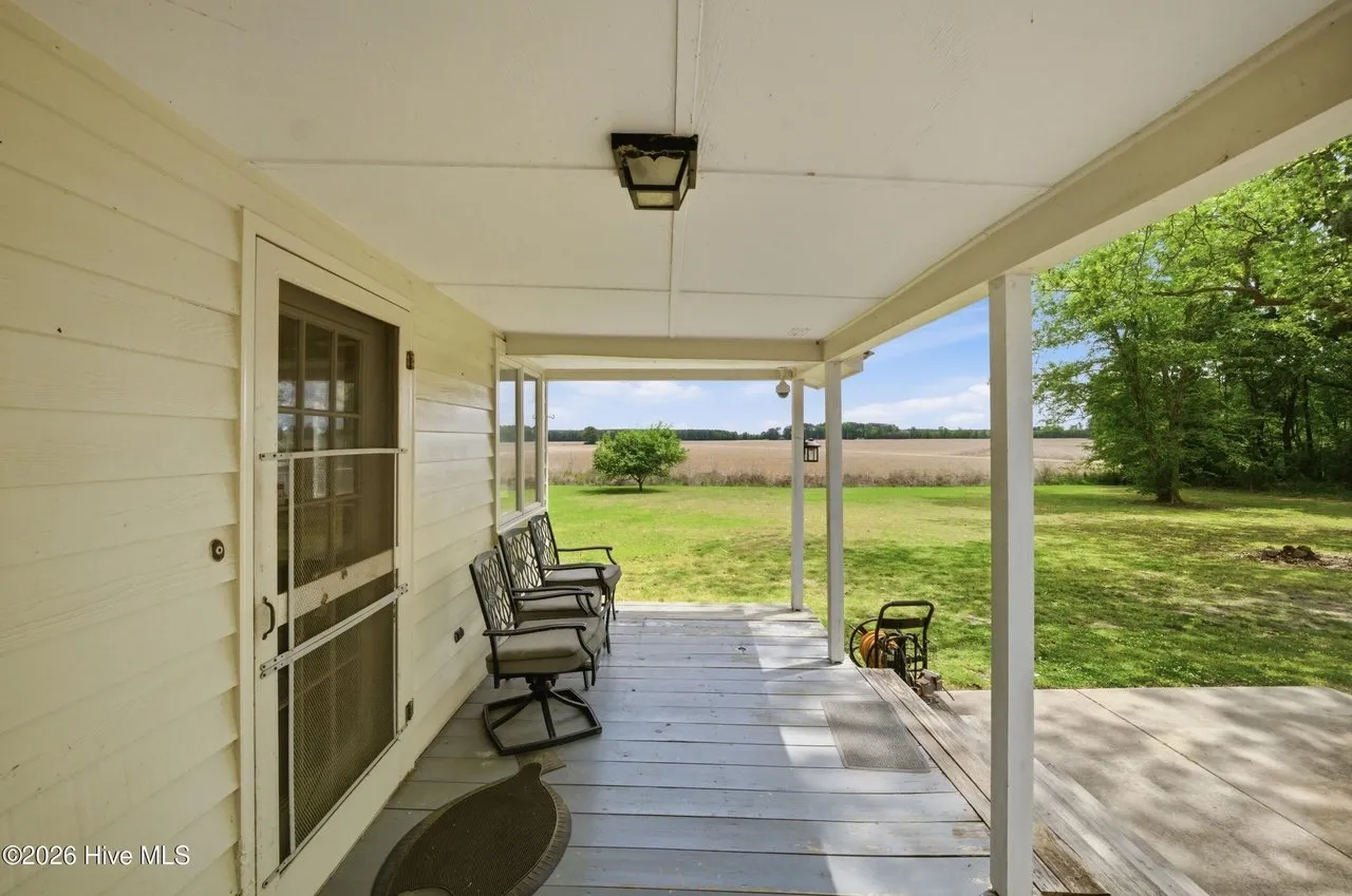 The side porch looking out over the field