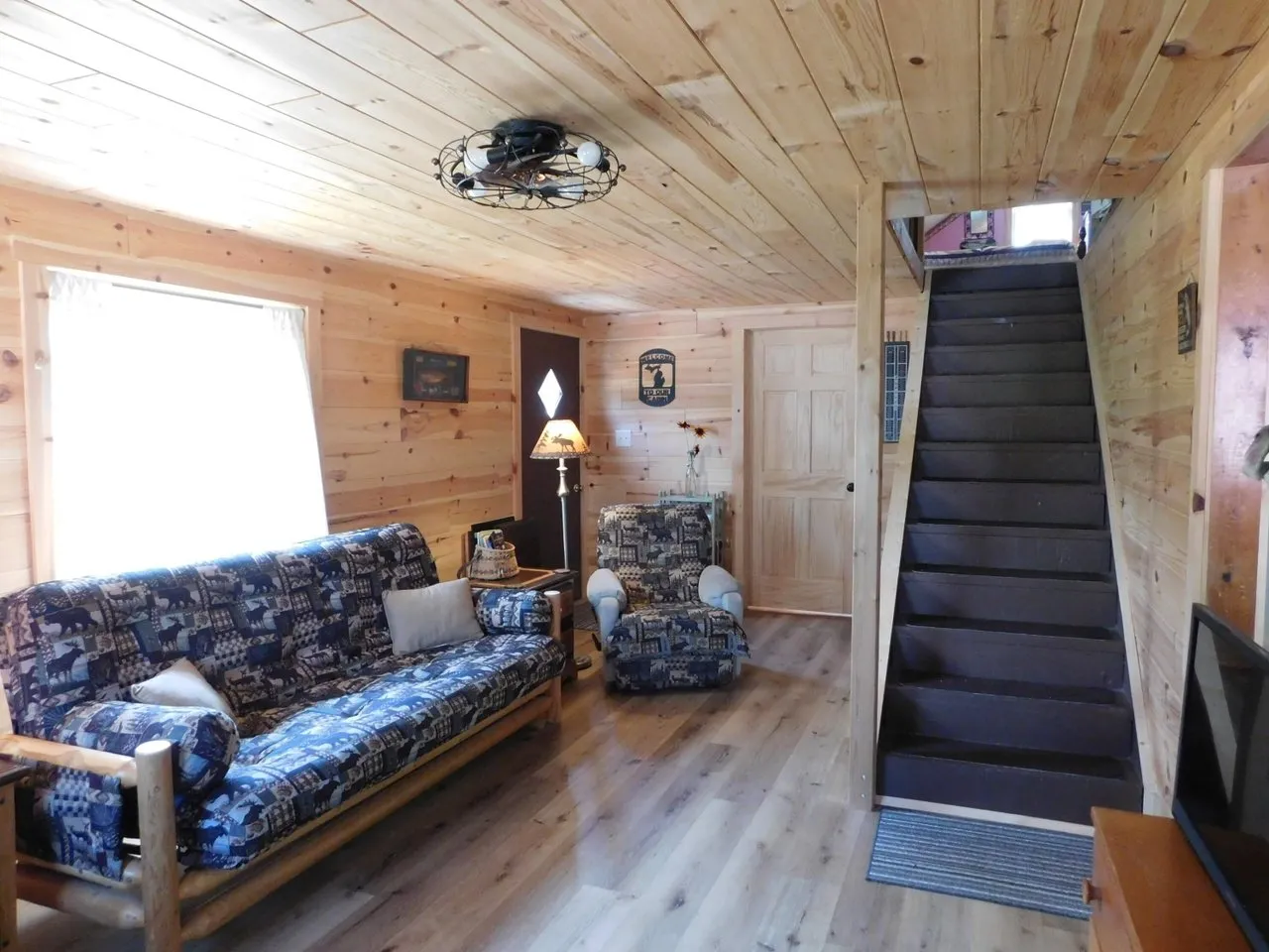 The living room from the other side, futon under the front window