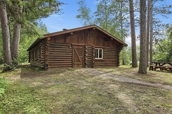 The second cabin from the side with the picnic table