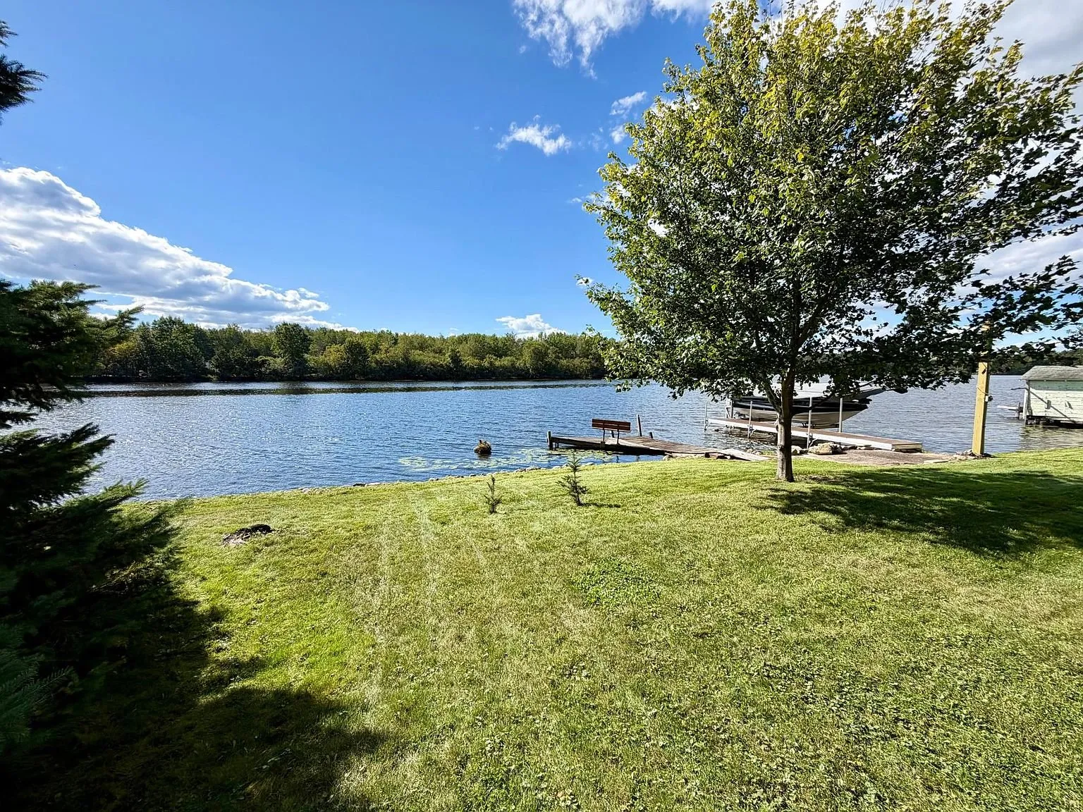 The shoreline and the lake with the far bank