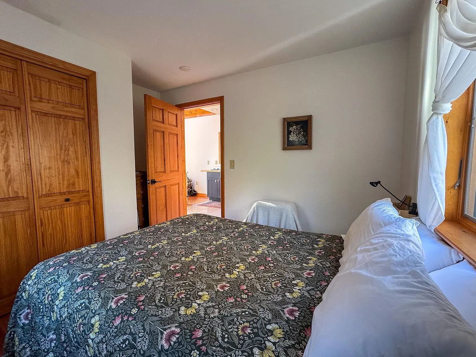 The sleeping loft with two twin beds tucked under the cathedral pine ceiling and skylights