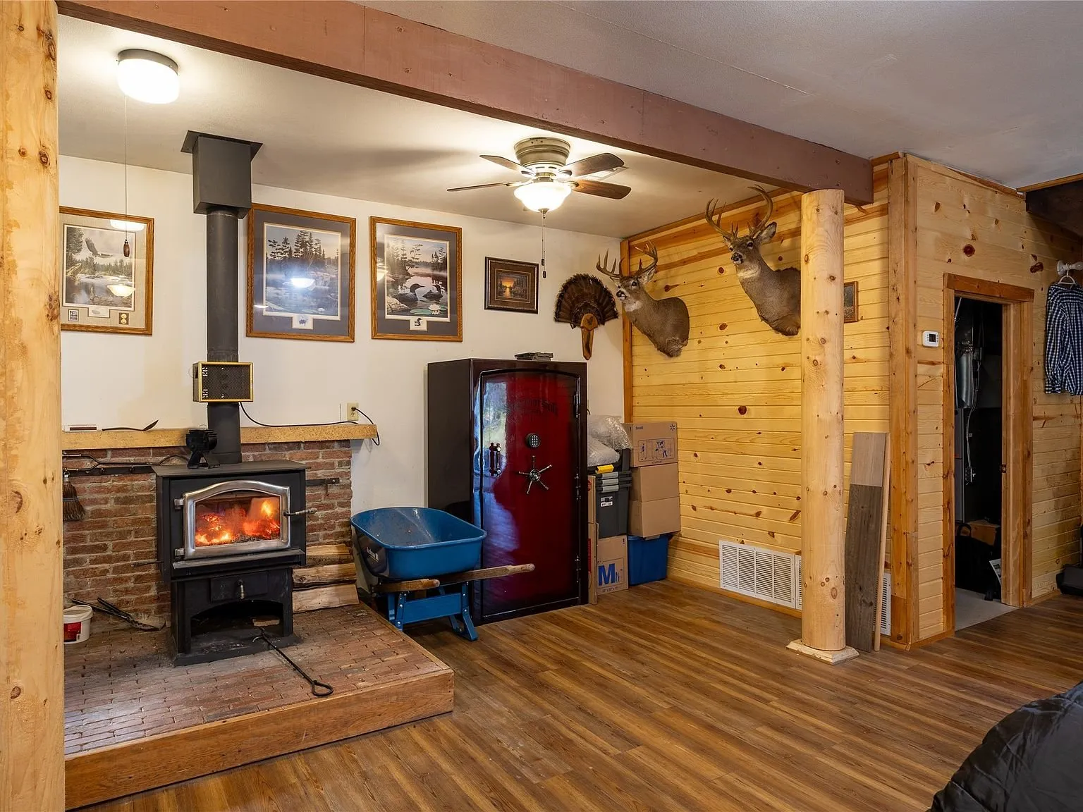 The living area and kitchen seen together in one open great room