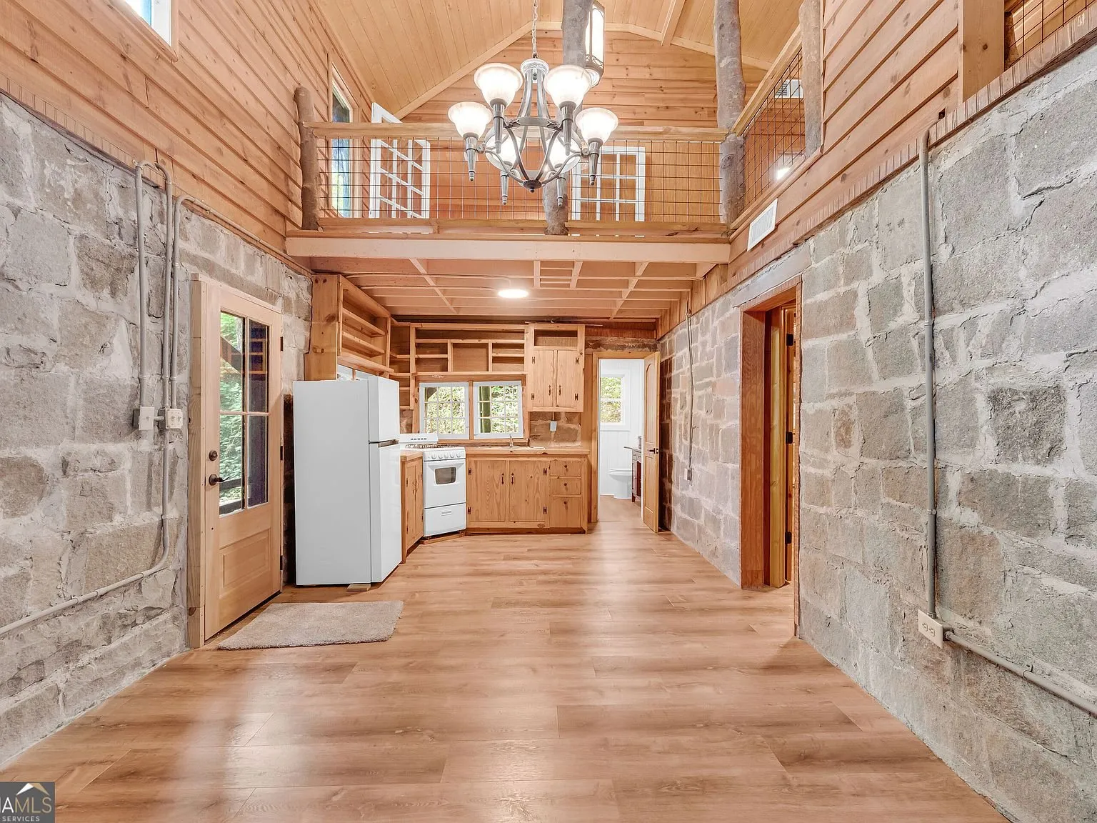 A loft area overlooking the living room below