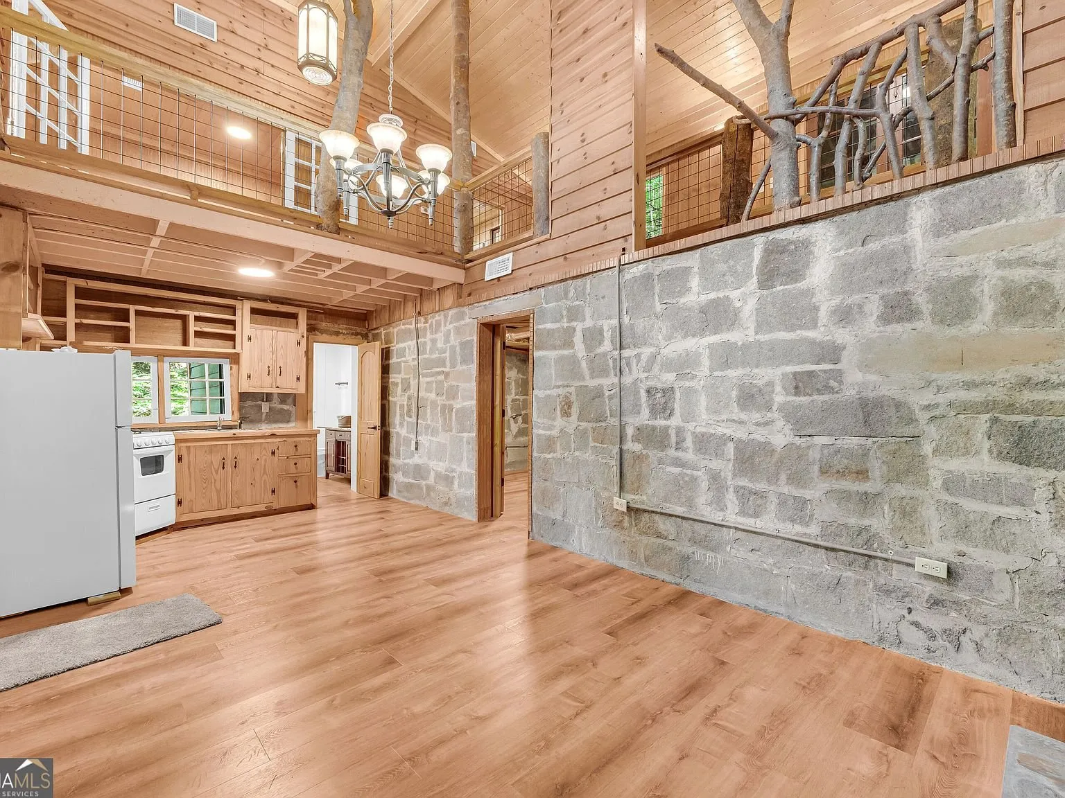 A second view of the open loft space above the main floor