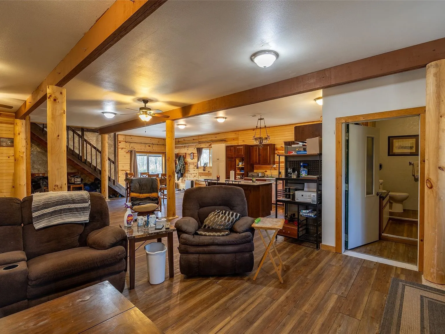 The wood-burning stove set on a tile hearth in the living room