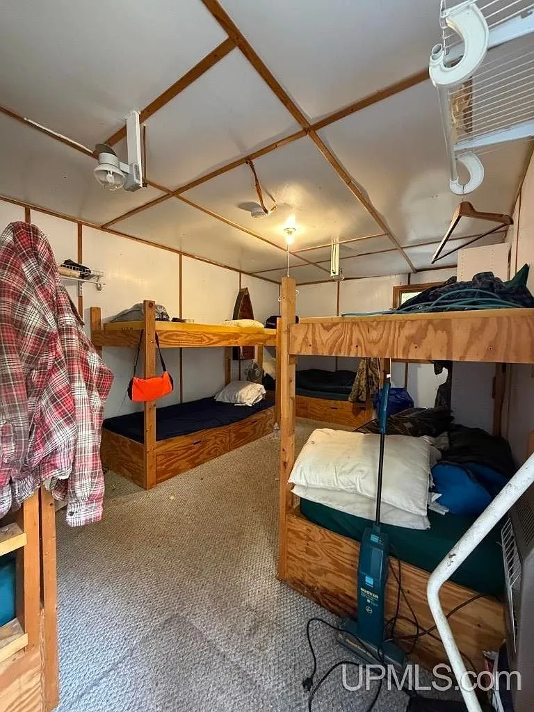 The open doorway and deck leading into the bunkhouse