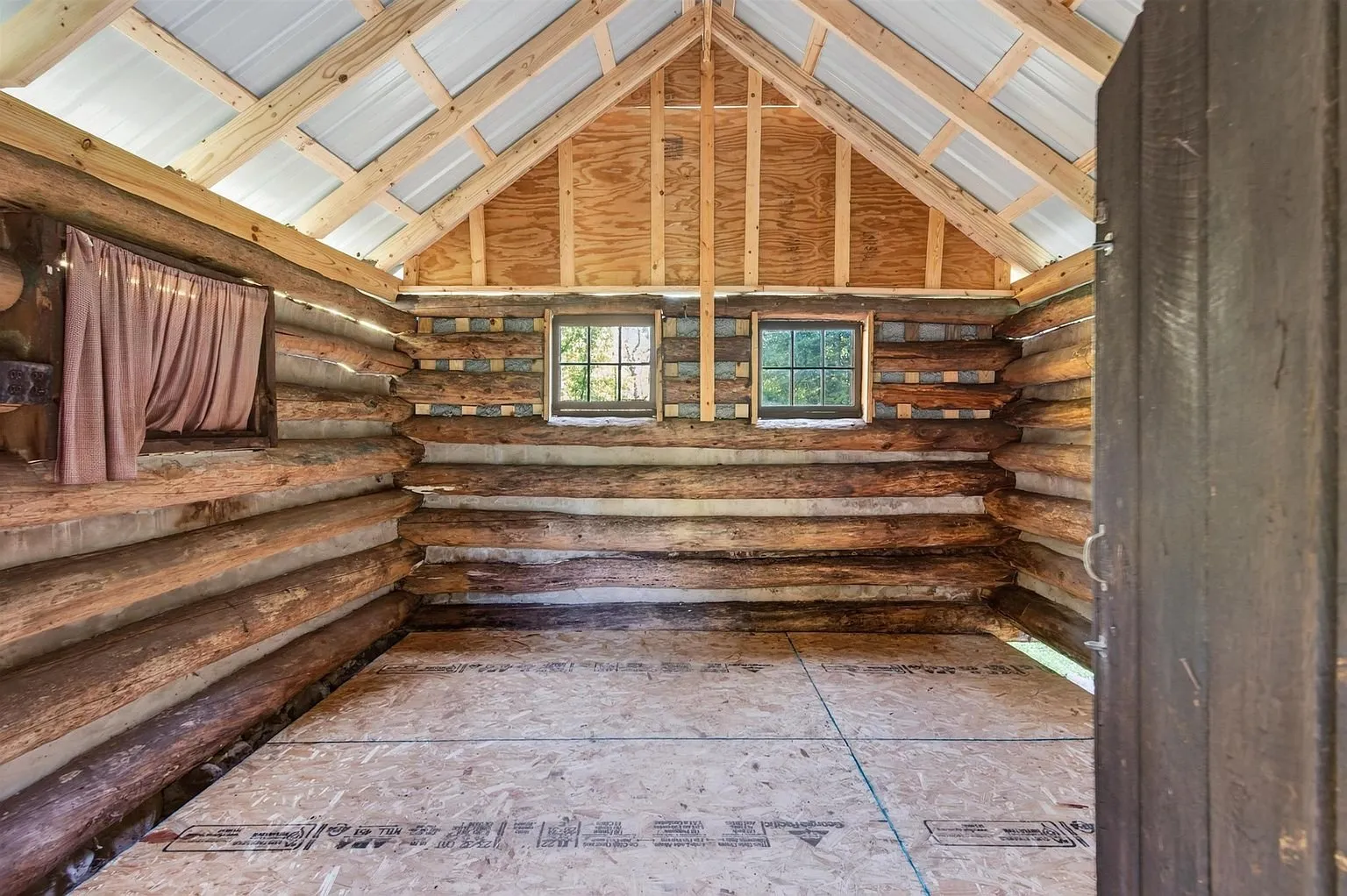Inside the shed with its shelving