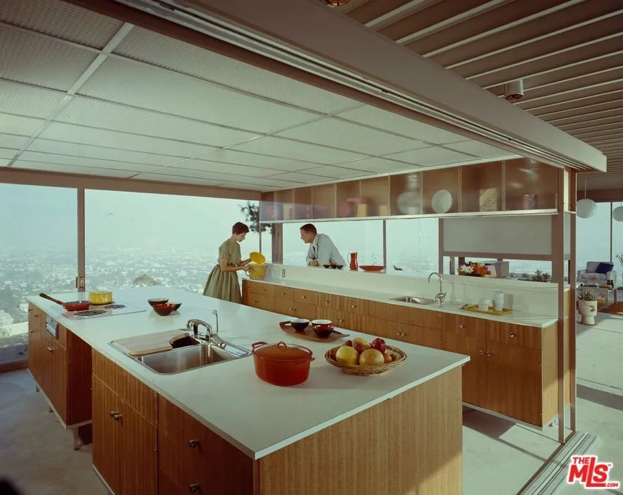 The kitchen island and counter looking out over the city