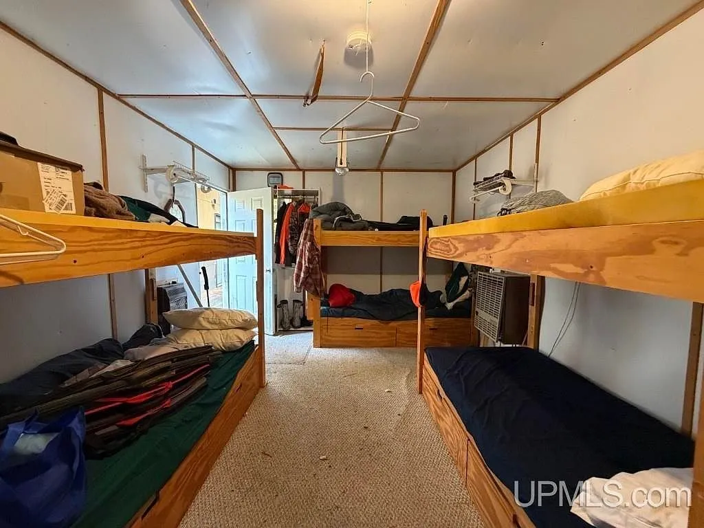 A second row of bunks inside the bunkhouse