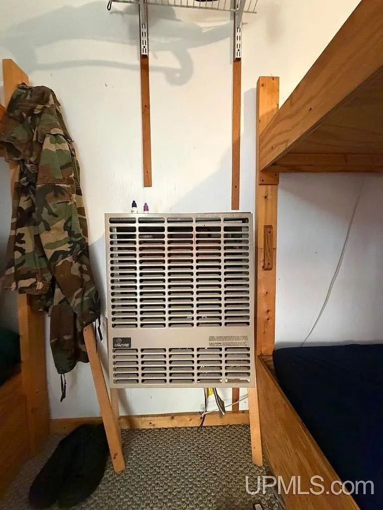 Bunks and sleeping space along both sides of the bunkhouse