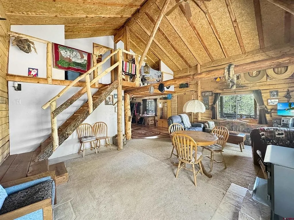 The living room toward the stair to the loft