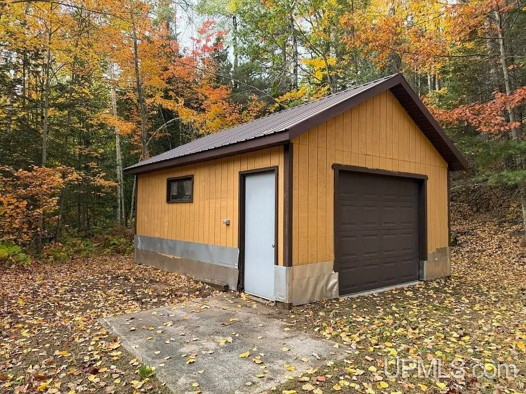 A propane space heater mounted inside the bunkhouse