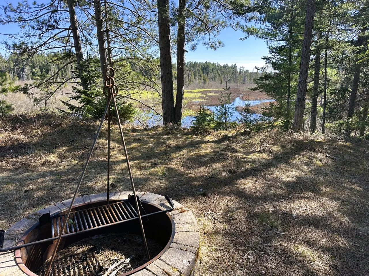 The firepit ring set in the clearing