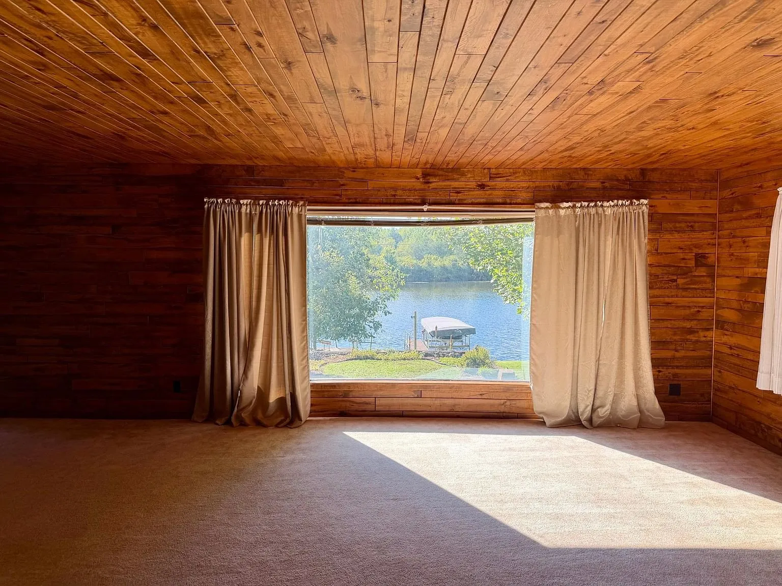 The living room window with the lake beyond