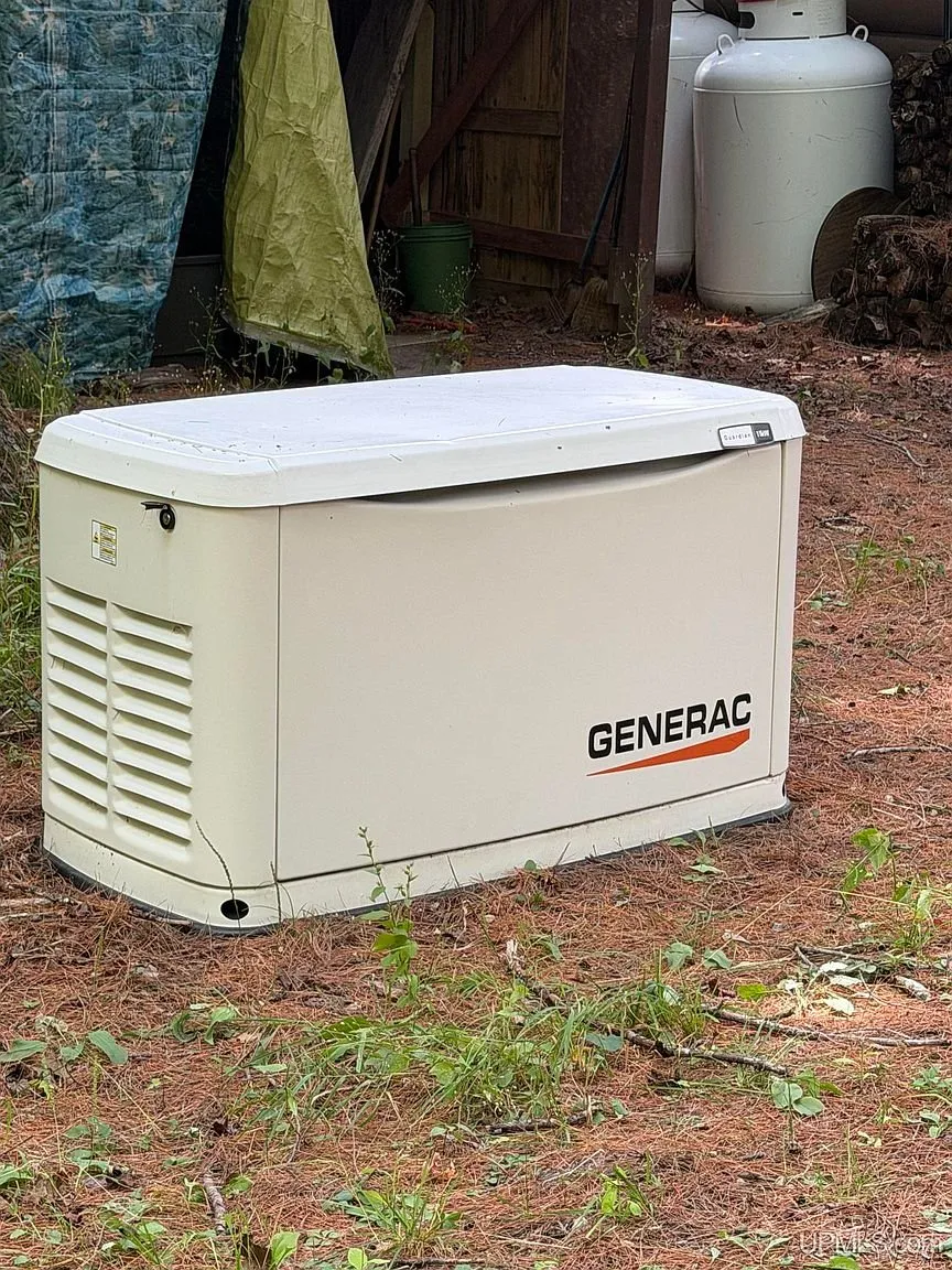 The Generac standby generator and the propane tank
