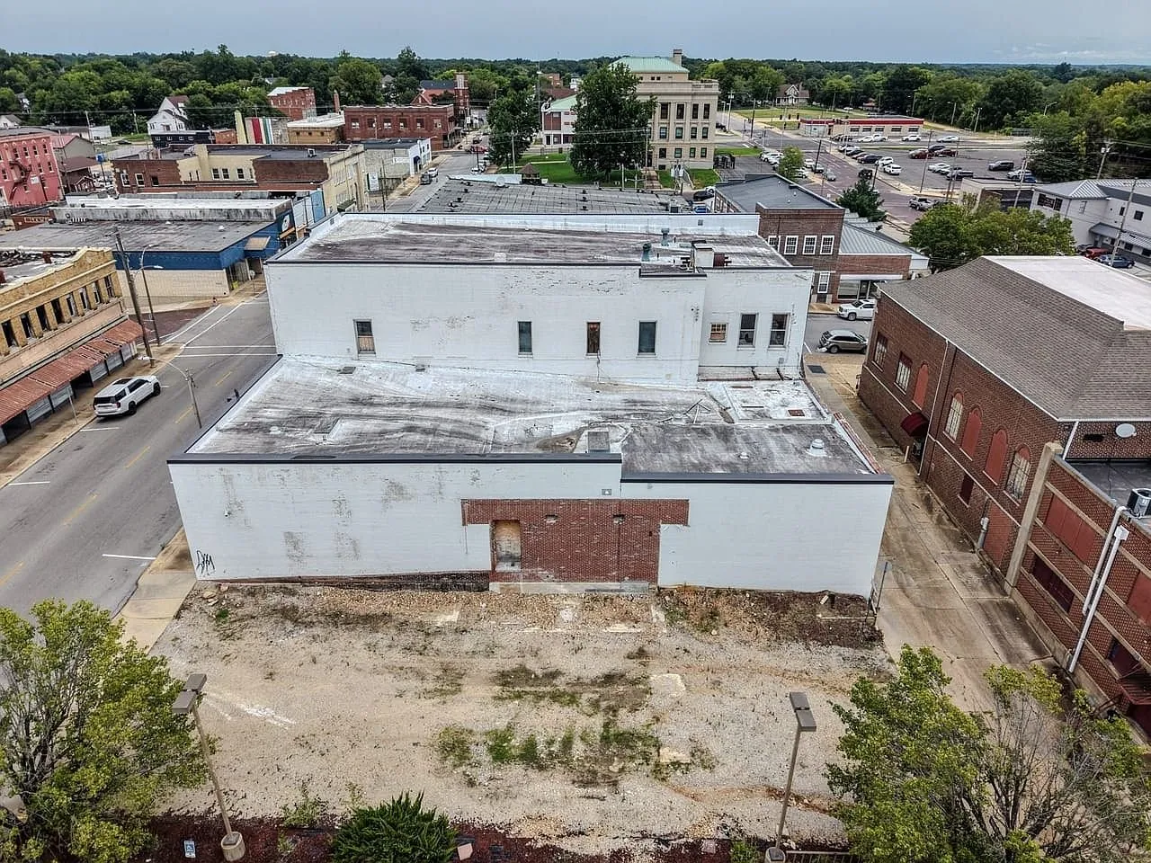 Aerial of the building's roof and the block behind it