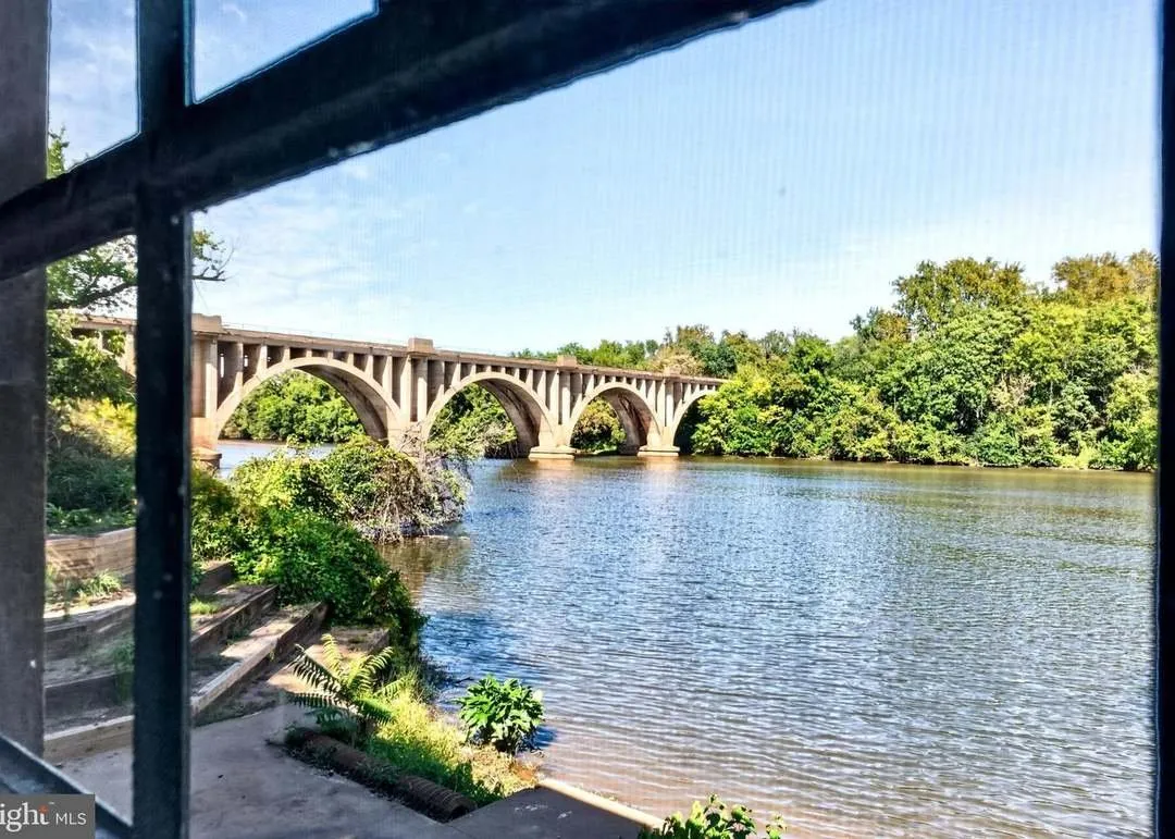 A view of the Chatham Bridge and river through the main room's steel-framed windows