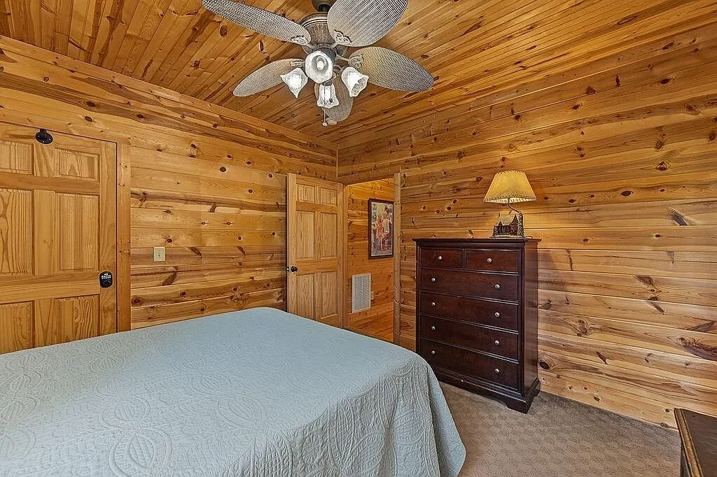 The primary bedroom's dresser, mirror and window