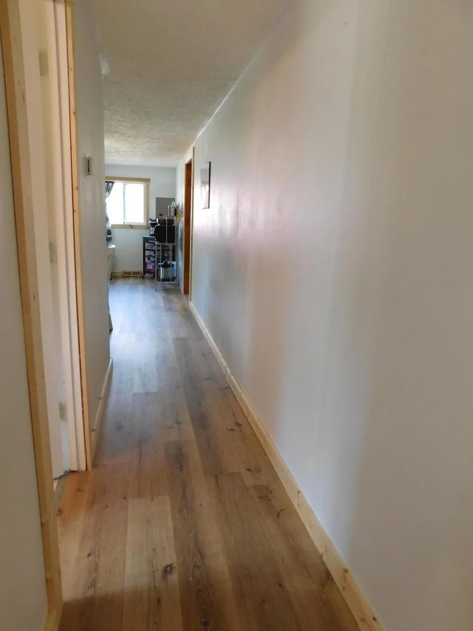 The hallway running between the bedrooms