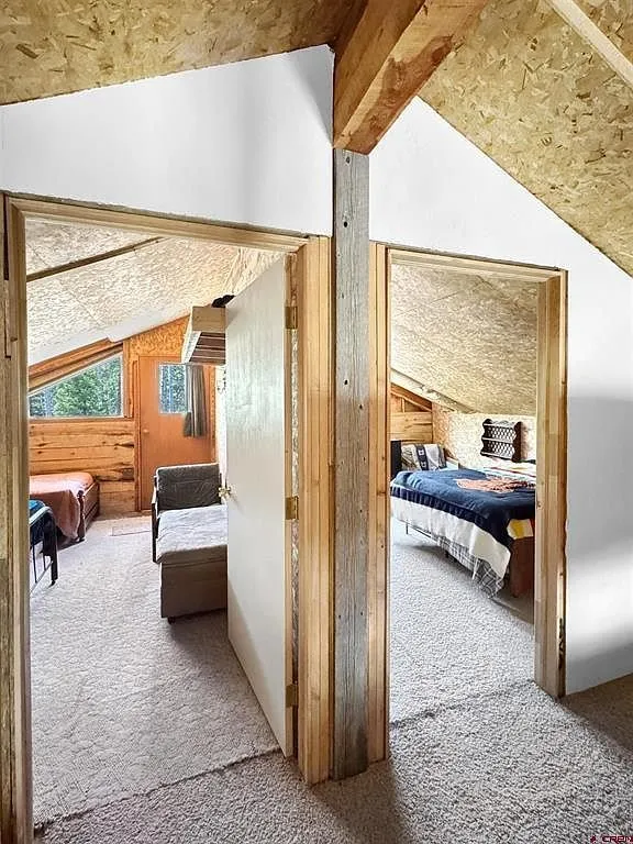The loft with the doorways to the two sleeping areas