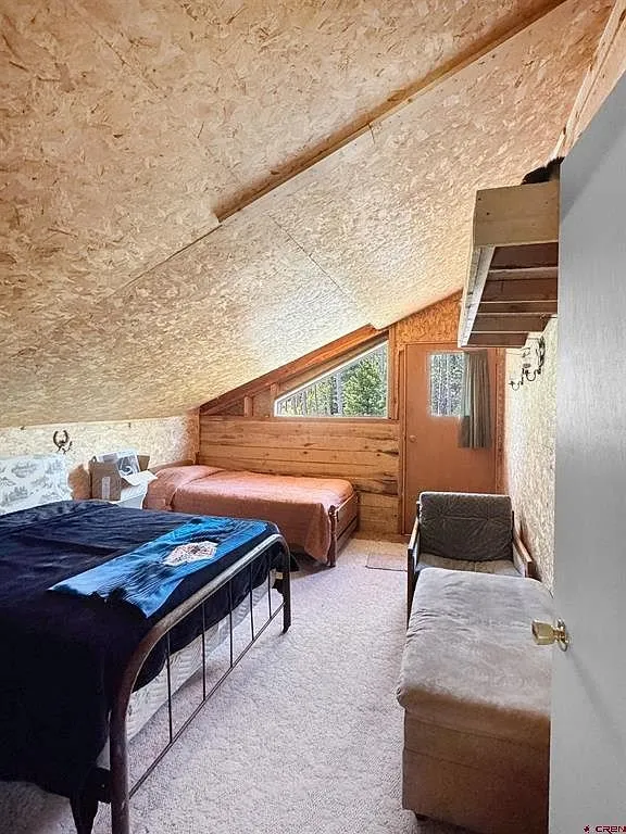 A loft bedroom under the slope of the roof