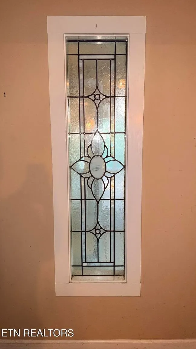 A stained glass panel in a door