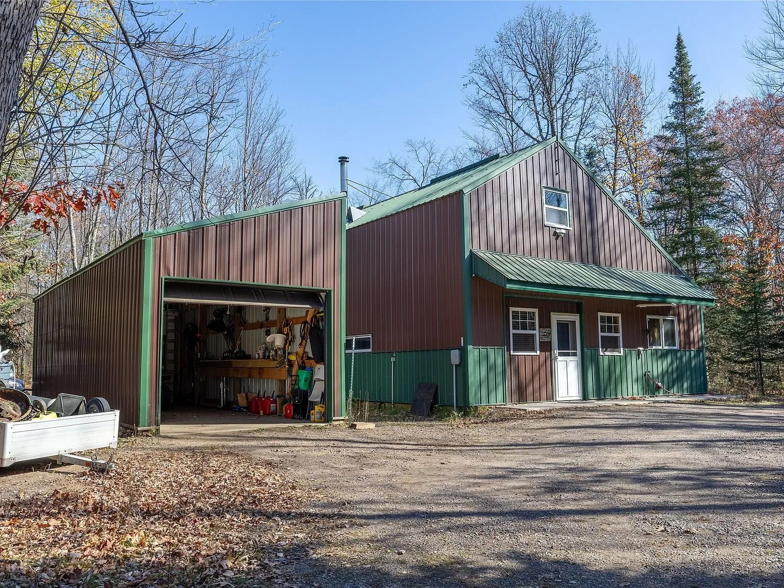 The home's exterior and attached garage bay seen from the driveway