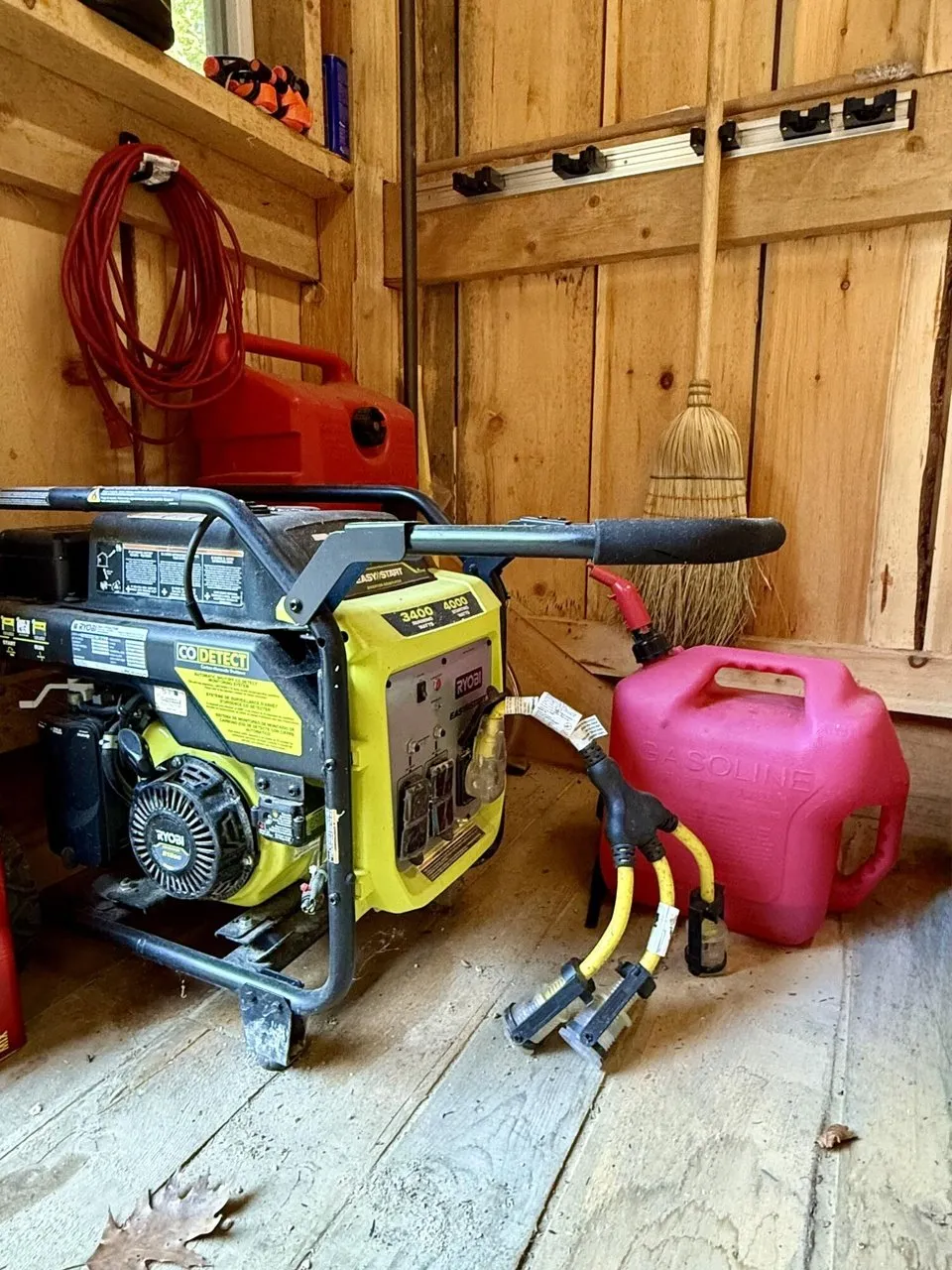 The generator and the gas can in the shed