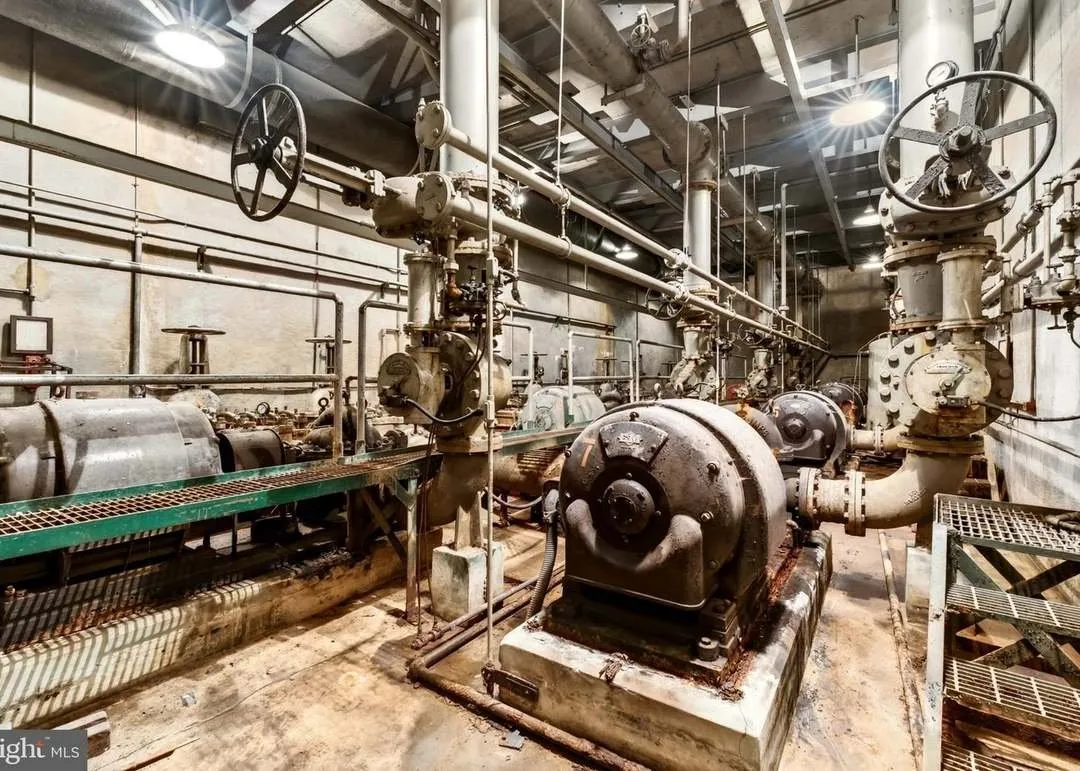 Valves and piping among the pump house's original equipment