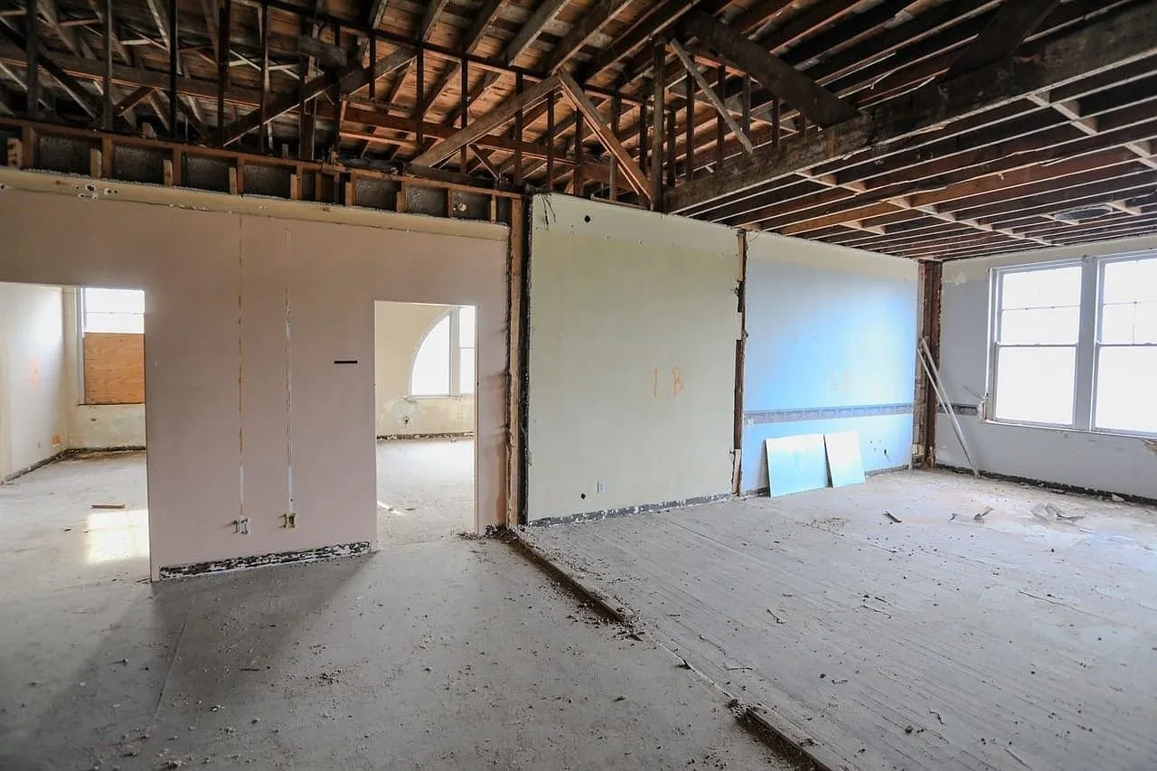 Partitions stripped to the framing on the upper floor