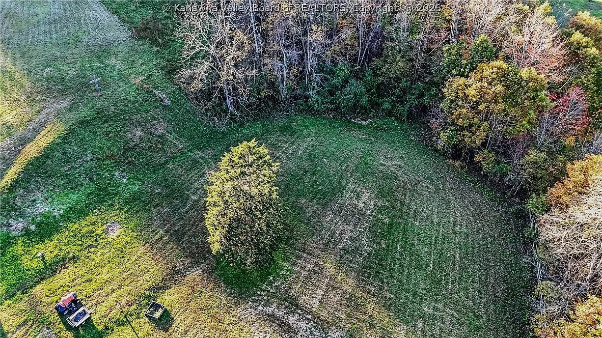 A second aerial view of the house's rear addition and bay window