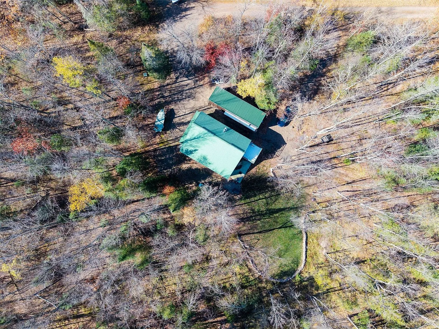 Aerial view of the home and pole barn seen directly from above