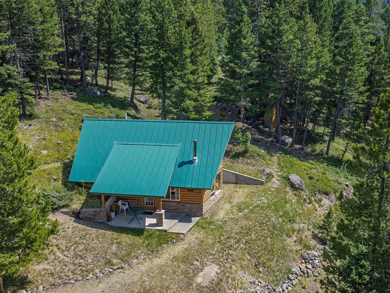 An aerial view of mountain ridgelines surrounding the property