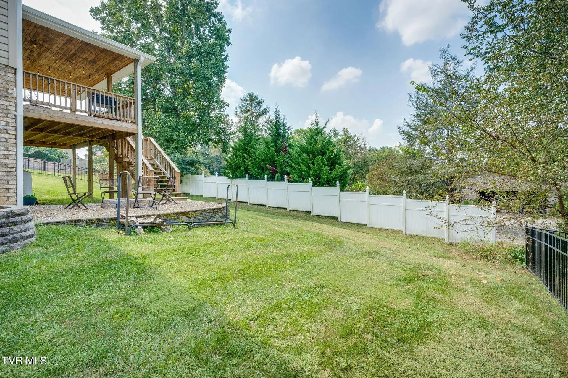 The back of the house with the deck above and the walk-out below