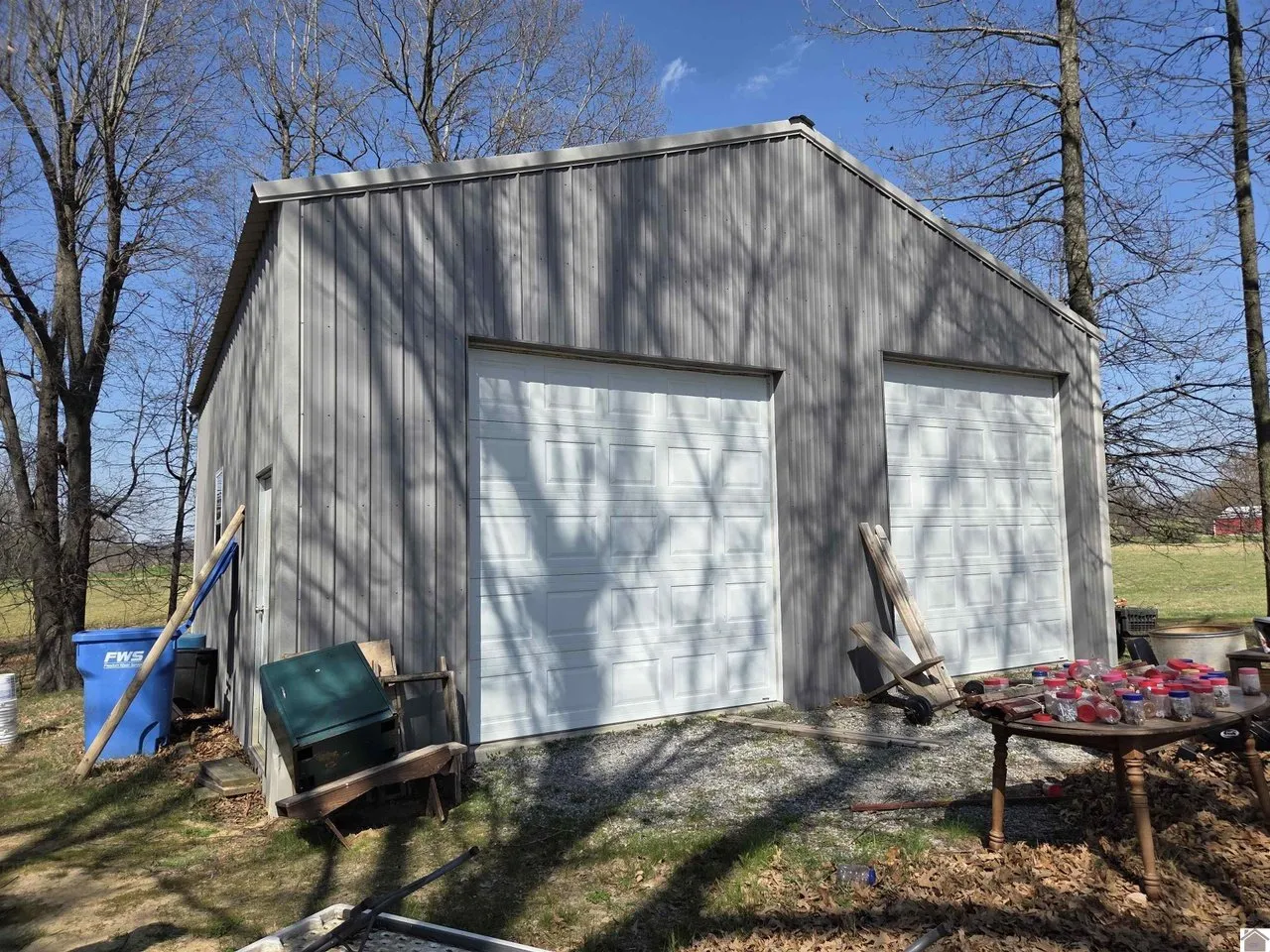 The metal-sided storage building for RV and boat parking