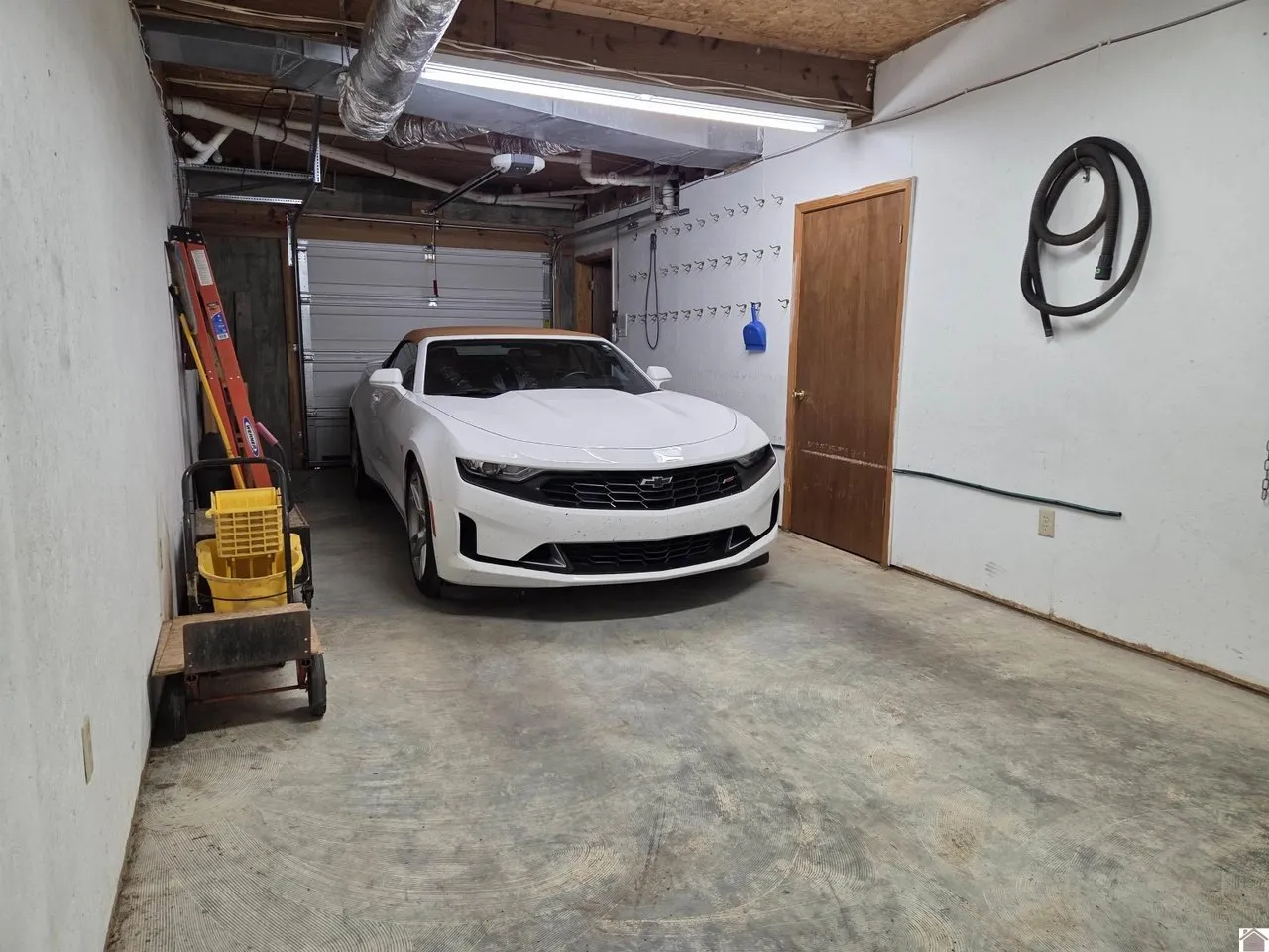 The garage with a car parked inside