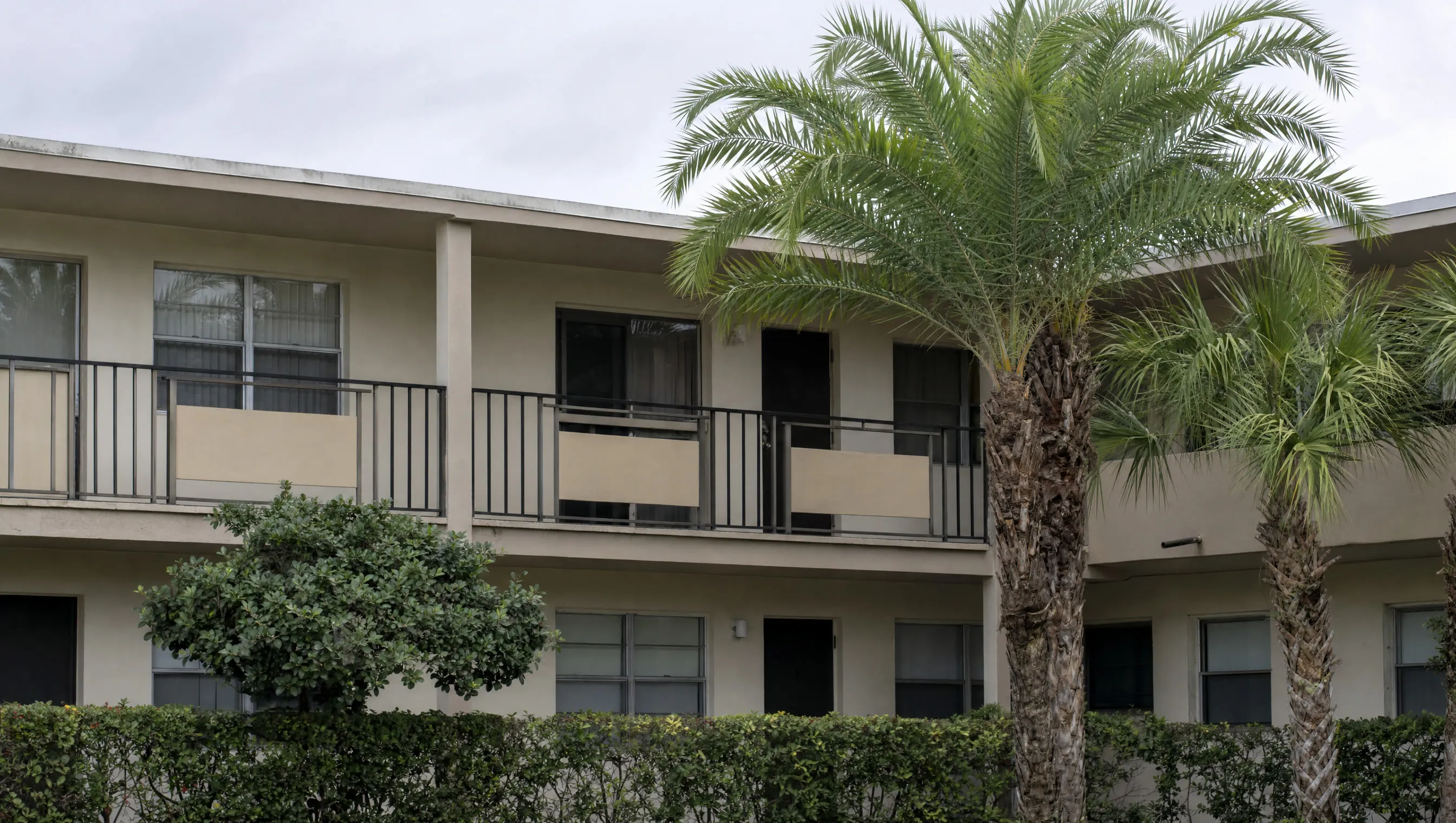 An older low-rise condo building exterior