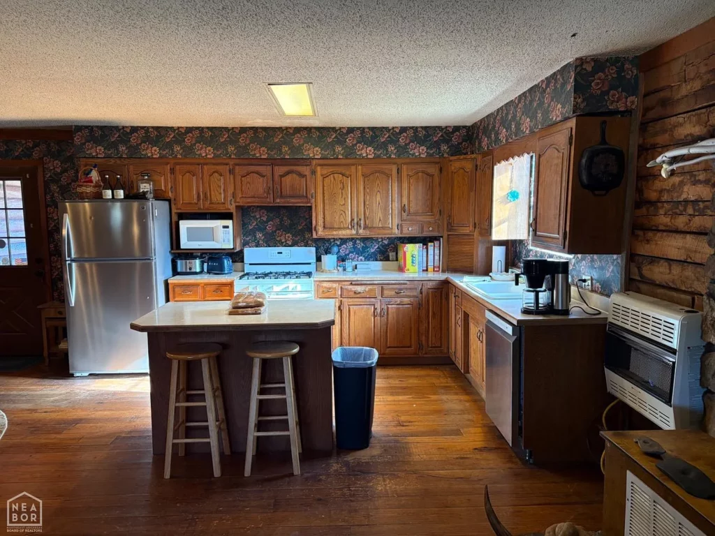Off Grid Log Home for Sale on 100 Acres in Salem, AR