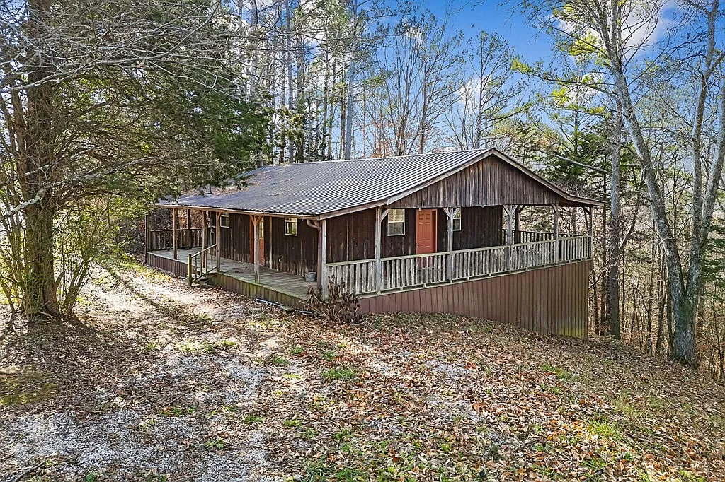 Charming cabin for sale on 3.2 acres at 7769 Willow Grove Hwy, Allons, TN 38541 for $175,000. Peaceful retreat near Dale Hollow Lake!